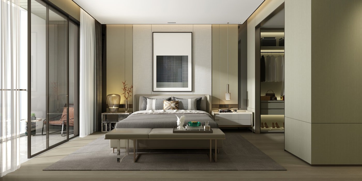 Bedroom with a large rug extending past the sides and foot of the bed