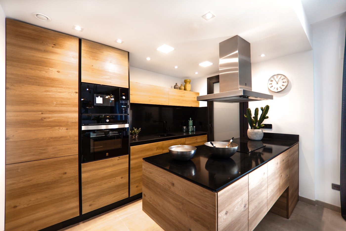 Kitchen with white painted uppers and wood lower cabinets